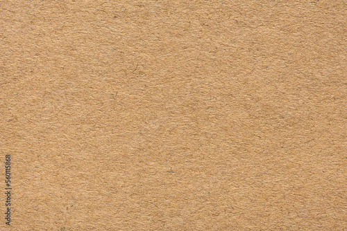 Brown Kraft paper texture background or cardboard surface.