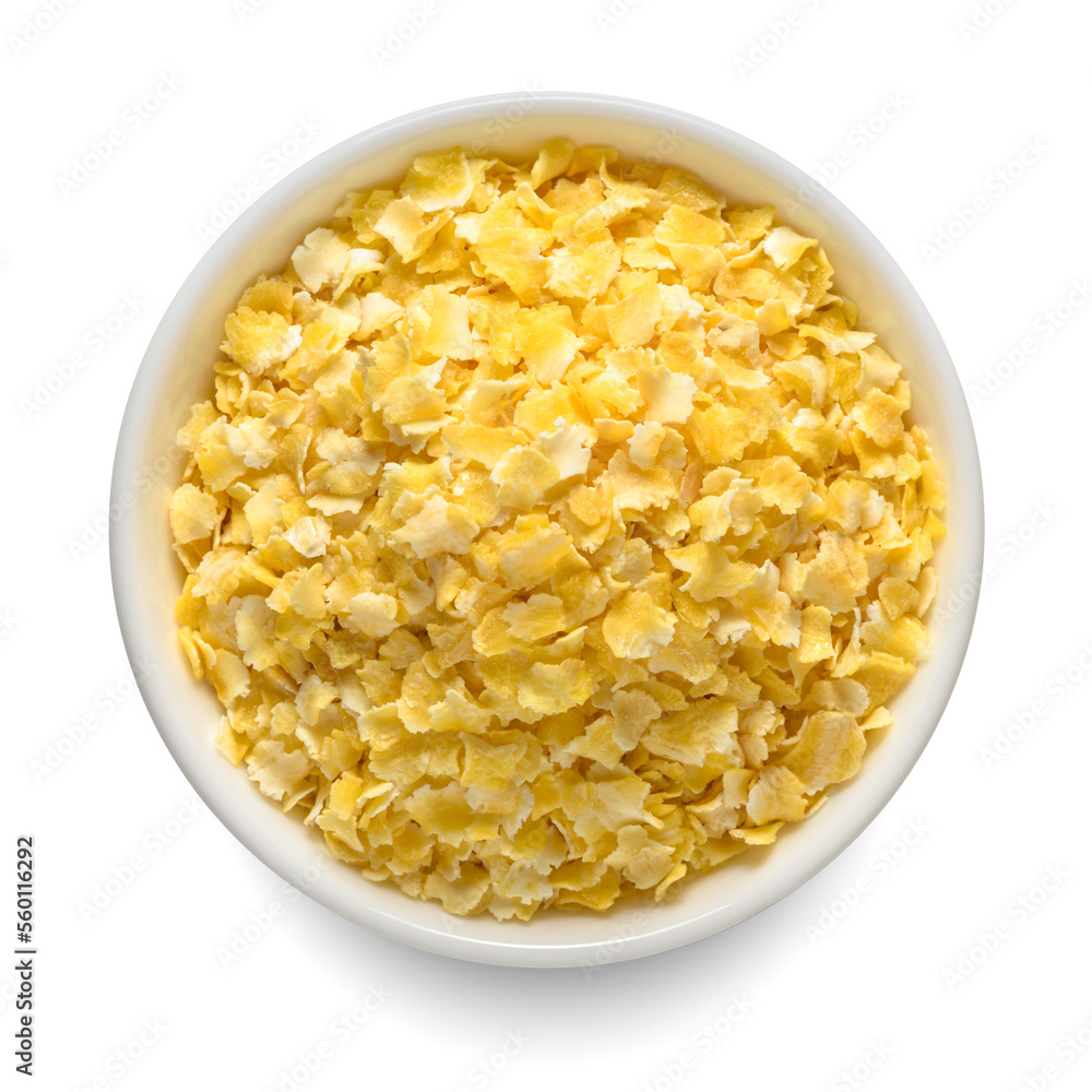 Corn flakes in white bowl isolated on white. Top view.