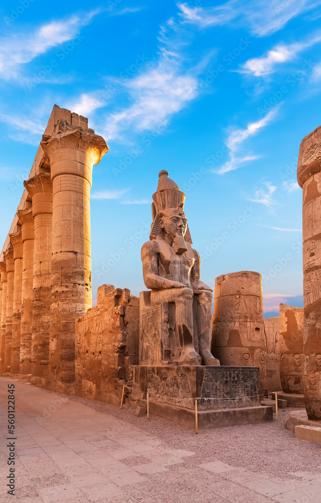 Seated statue of Ramesses II by the First pylon of the Luxor Temple, Egypt