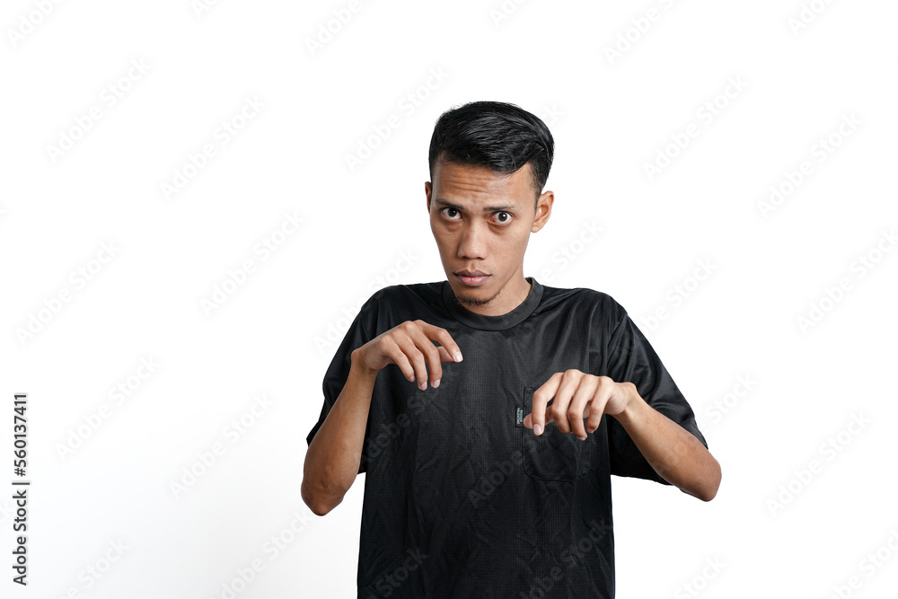 Asian man wearing black training t-shirt, gesturing to fight. Isolated by white background Asian man wearing black training t-shirt, gesturing to fight. Isolated by white background