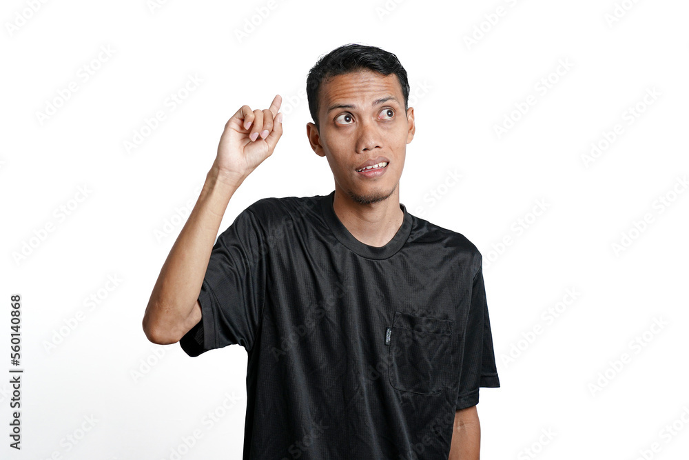 Asian man wearing black training t-shirt, Gesture thinking or getting idea. Isolated by white background Asian man wearing black training t-shirt, Gesture thinking or getting idea. Isolated by white background