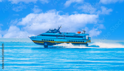 hydrofoil boat runs at full speed on the sea waves © peuceta