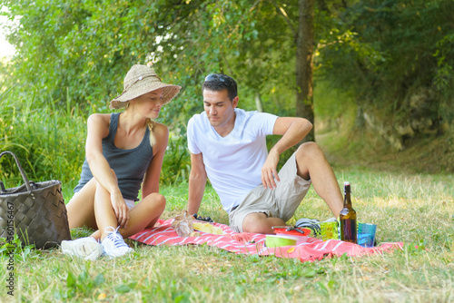 young couple on a picnic © auremar