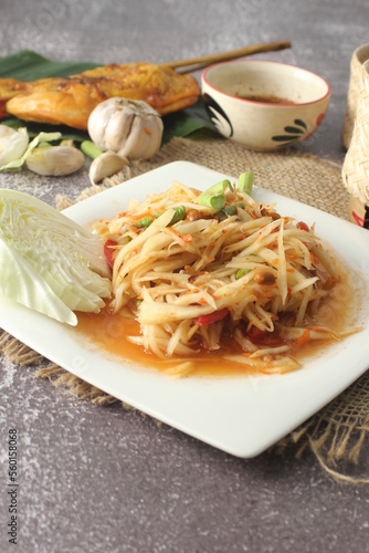 Papaya Salad, Thai food that is spicy, sour, is a dish in the northeast of Thailand. photo