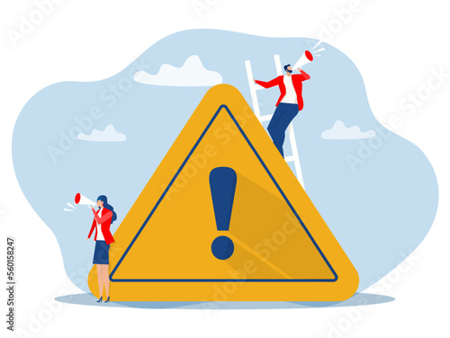 Two business people holding megaphone with important announcement. Attention or warning information By standing near exclamation sign. Marketing and advertising alert and beware concept