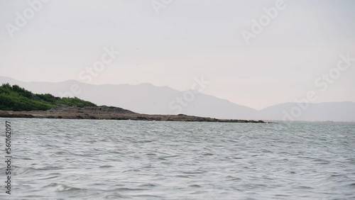 Lake landscape with mountains at sunrise. Lake of Leucate, Languedoc-Roussillon, France.
Lake of Salses between the departments of Pyrénées-Orientales and Aude in Occitania. photo