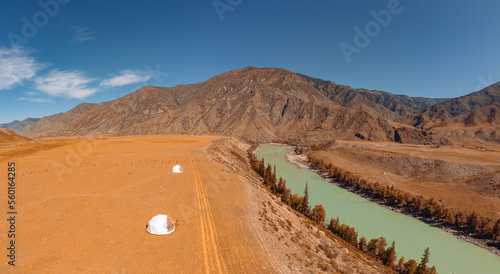 Camping house travel  aerial top view. Tent for tourism background forest Altai mountains  tourist relax.