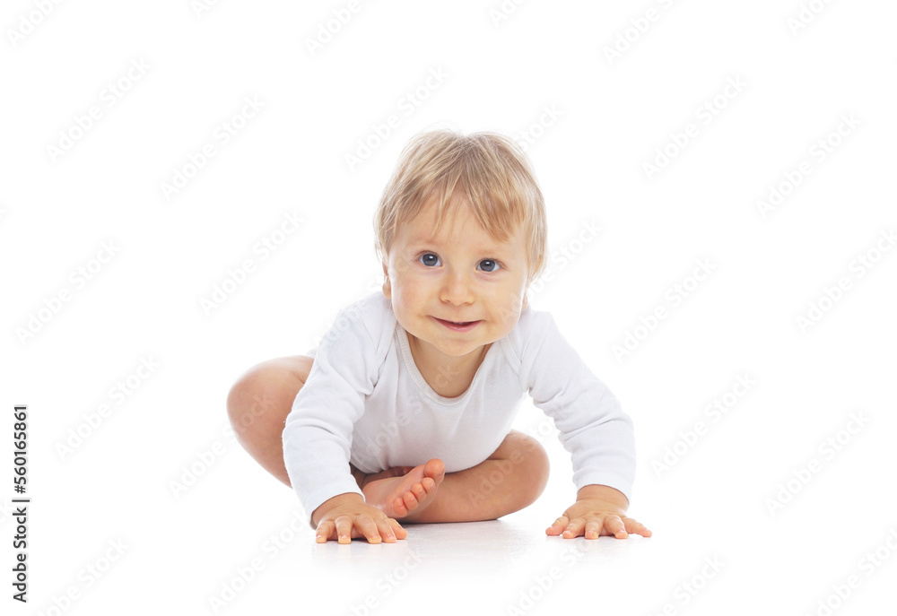 Little, happy and smiling cute baby in the studio. Portrait of a one year old baby. The concept of happiness. Little, happy and smiling cute baby in the studio. Portrait of a one year old baby. The concept of happiness.