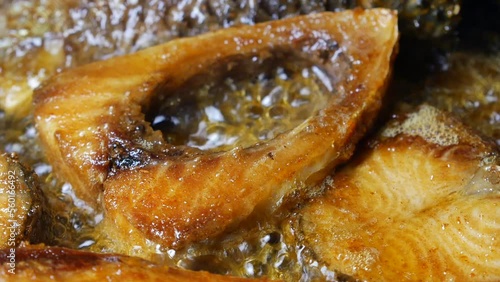 close up of cooking ilsha fish in a cooping pan  photo
