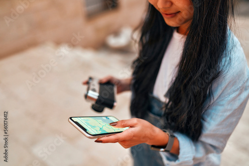 Asian female tourist student on city streets