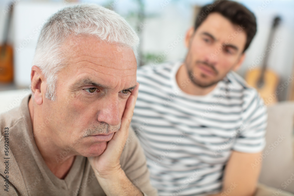 offended senior male ignoring middle-aged son offended senior male ignoring middle-aged son