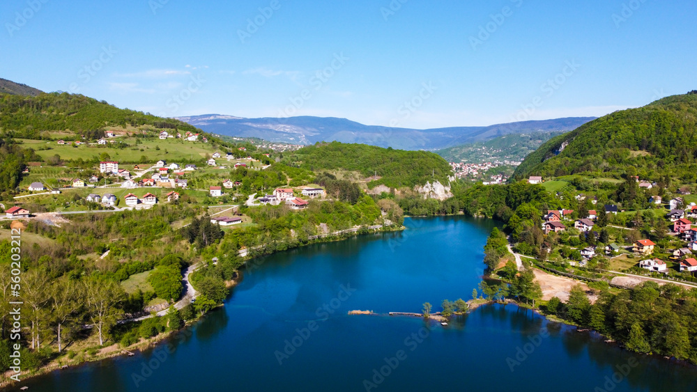 Plivsko jezero, Jajce, Bosnia and Herzegovina. Aerial drone view of lake, villages and forest in early spring. 