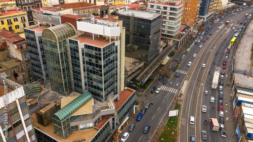 Fototapeta Naklejka Na Ścianę i Meble -  Naples, Italy - January 2023: Aerial view of the glass building housing the law faculty of the Federico II university. The building overlooks via Marina.