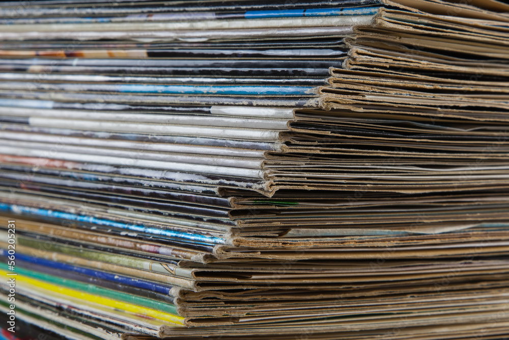 A stack of LP covers from long-playing records. Record covers may be vintage, but they certainly aren't history. A cover you can look at when you put the record on, is the connection to the music.. A stack of LP covers from long-playing records. Record covers may be vintage, but they certainly aren't history. A cover you can look at when you put the record on, is the connection to the music..