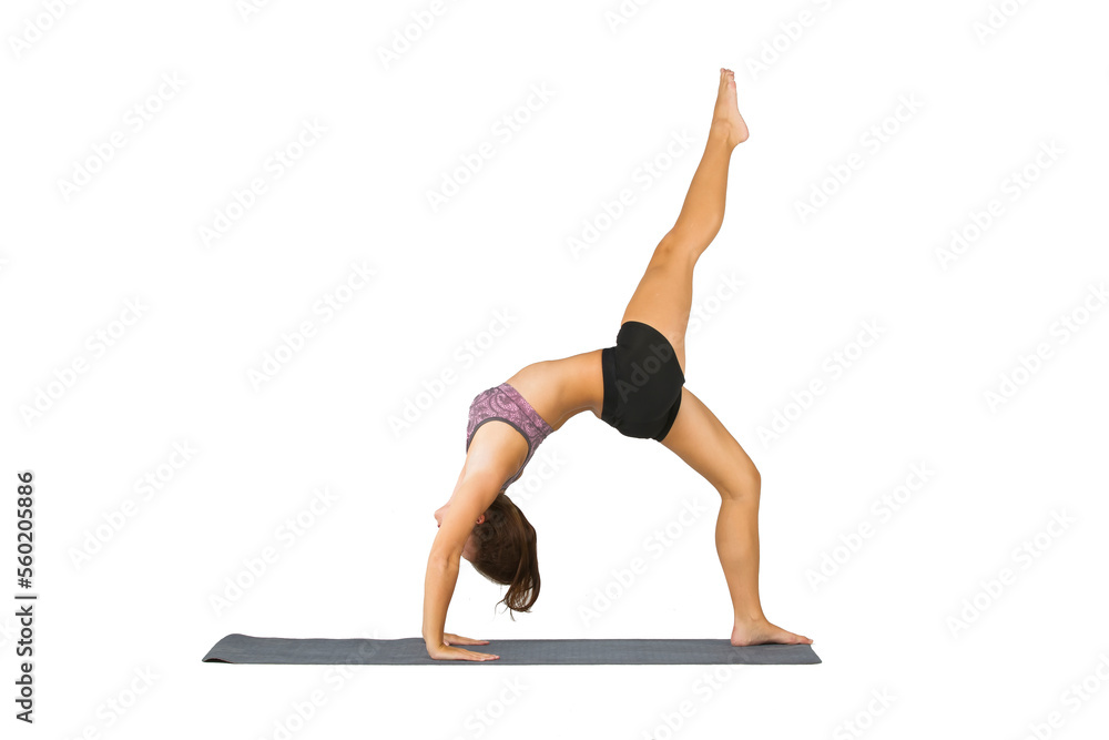 Brunette Yoga Fitness Model Exercises In A Studio Environment