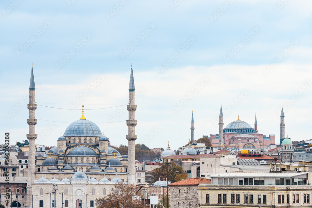 Stunning view of the Sultan Ahmed Mosque or Blue Mosque and the Santa Sofia Mosque during a cloudy day. The Blue Mosque is an Ottoman-era historical imperial mosque located in Istanbul, Turkey.