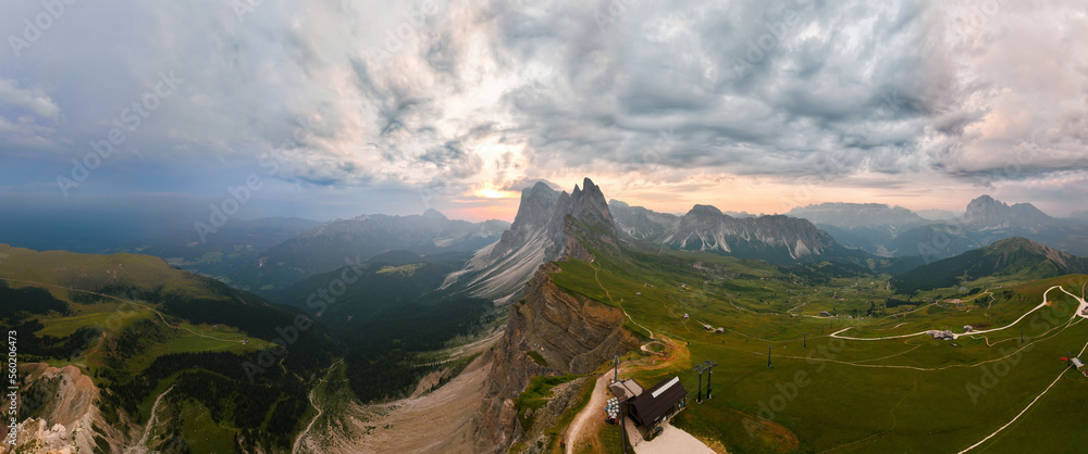 Stunning panoramic view of the Seceda ridge during a cloudy day. The Seceda with its 2.500 meters is the highest vantage point in Val Gardena, Dolomites, Italy..