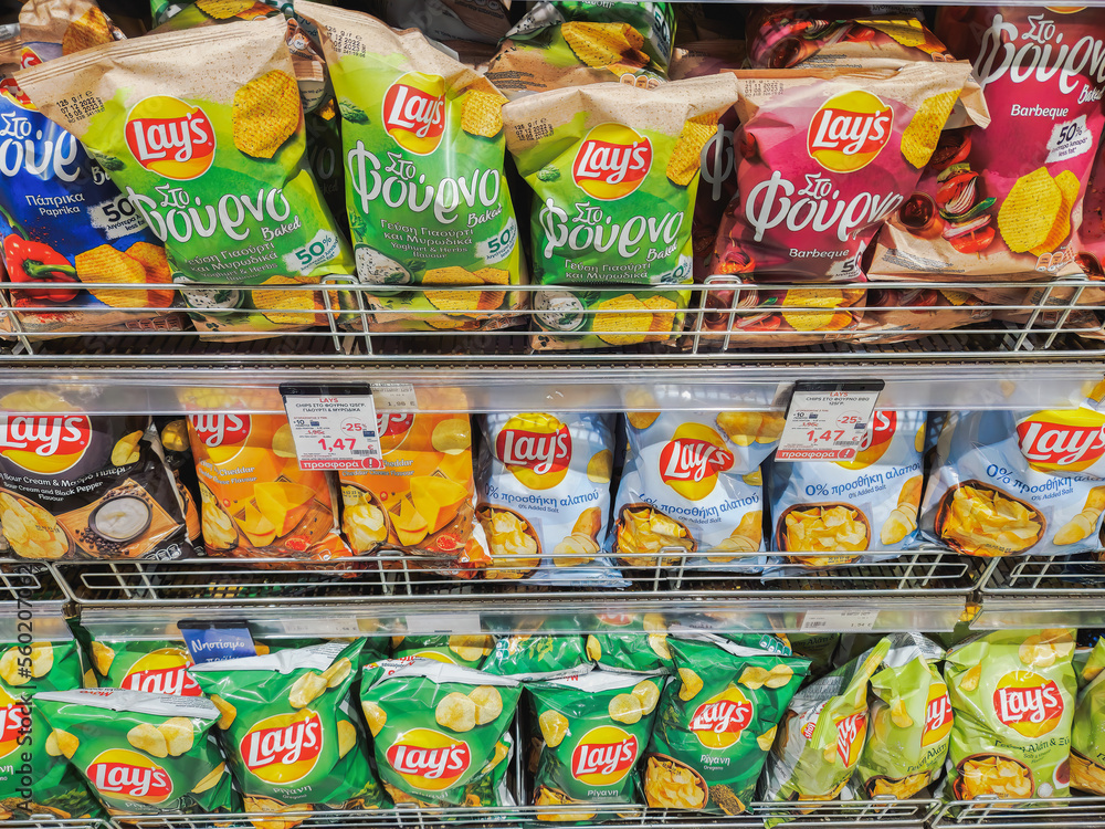 Lays Potato chips on sale at the supermarket. Store interior with