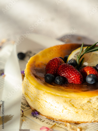 close up cheesecake with fresh strawberry and blueberries