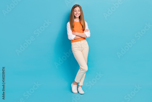 Photo of pretty lovely lady wear fashionable outfit new clothes collection arm crossed isolated on blue color background