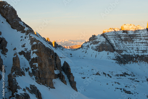 sunrise in the snow dolomites photo