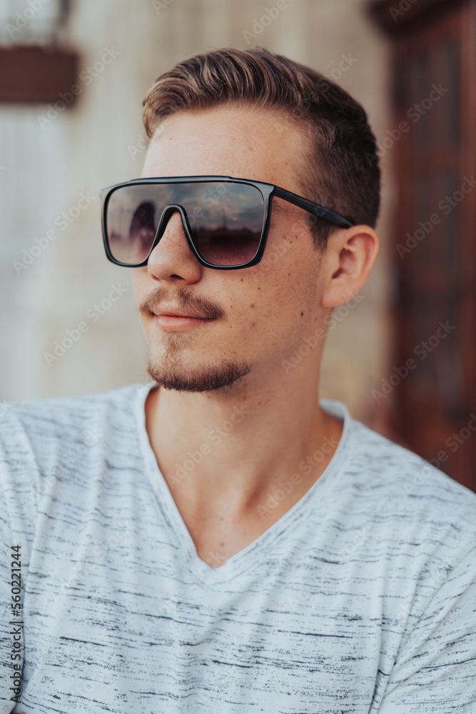 Portrait of Young Man with Sunglasses Portrait of Young Man with Sunglasses