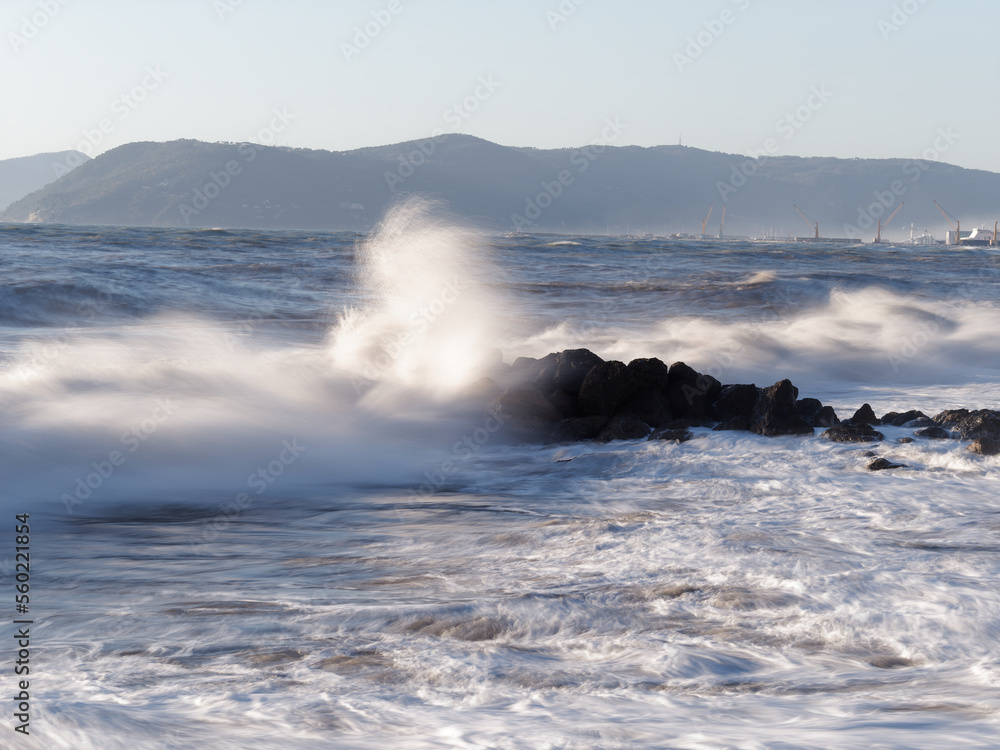 Crashing waves on the beach in massa
