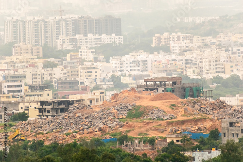 Aerial view of the densely packed concrete buildings in the urban cityscape of Hyderabad.