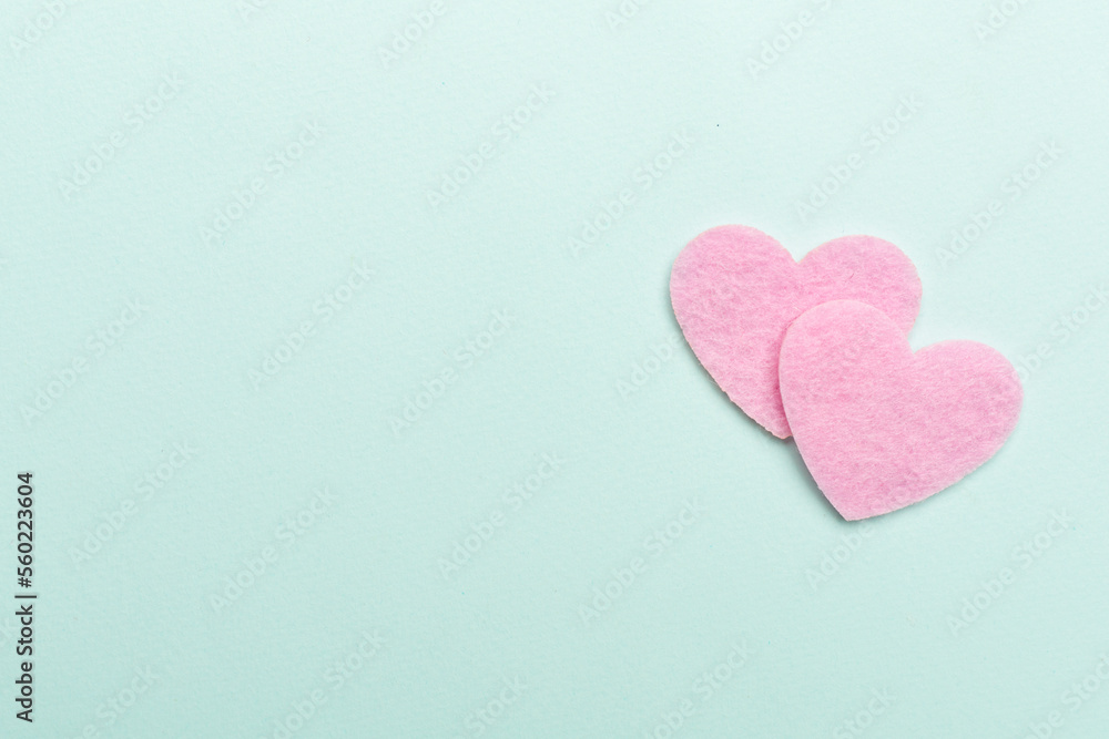 Felt hearts on color background, top view Felt hearts on color background, top view