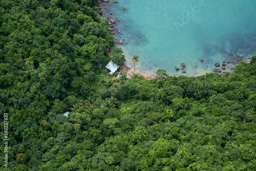 aerial view of a hut on a beach in a rainforest near an ocean in Vietnam, Asia