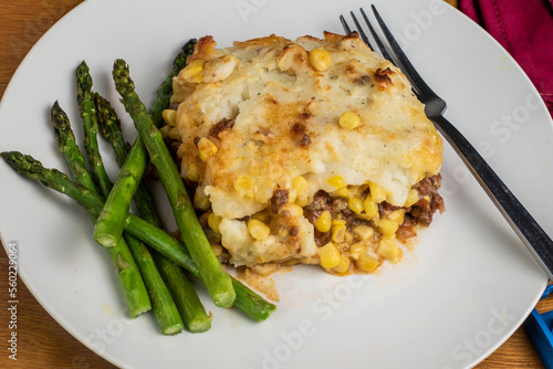 shepards pie  served with sauteed asparagus photo