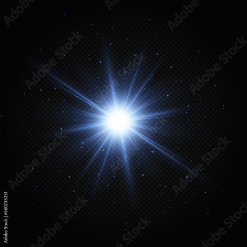 Shining blue star. Light Effect Bright Star, Christmas Star. Blue glowing light explodes.