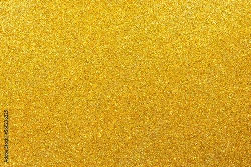 Golden wide background with reflective glitter material