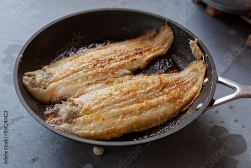 Fotografi Sole fish prepared on a frying pan