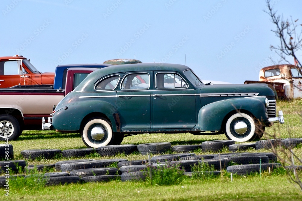 Fototapeta premium an old car with whitewall tires