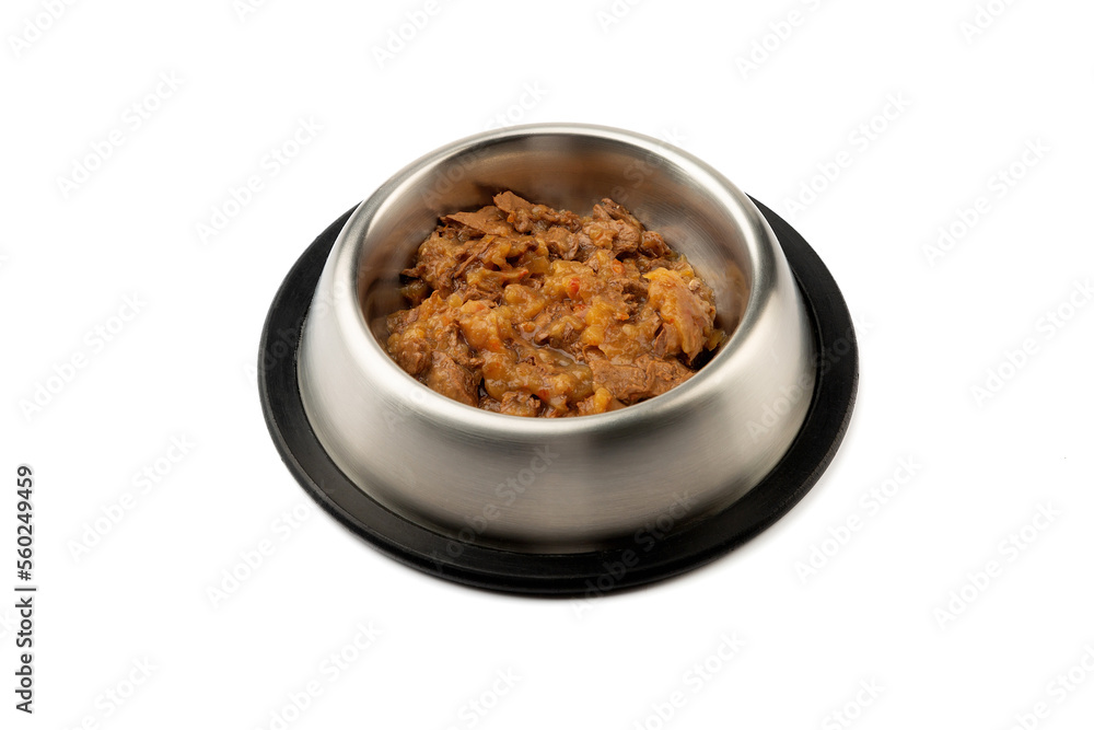 Wet food for cats and dogs in a bowl on a white background. View from above. Wet food for cats and dogs in a bowl on a white background. View from above.