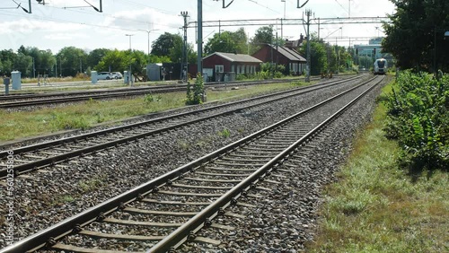 A local train in Scandinavia arriving to a train station
