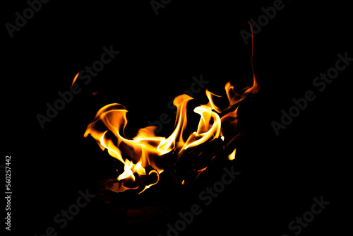 Fire flame texture. Burning material backdrop. Burn effect pattern. Blaze and torch wallpaper. Heat and haze backdrop. © Jozsef