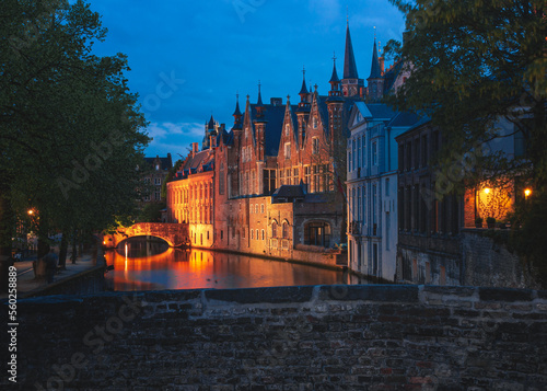 Night view on the historic medieval buildings along the canal in Bruges