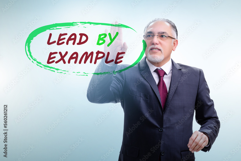 Businessman in lead by example concept Businessman in lead by example concept