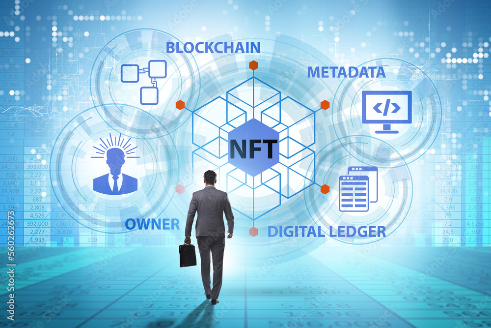 Businessman in NFT non fungible concept Businessman in NFT non fungible concept