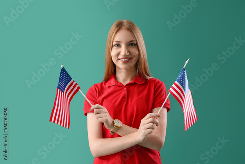 Young redhead woman with US...