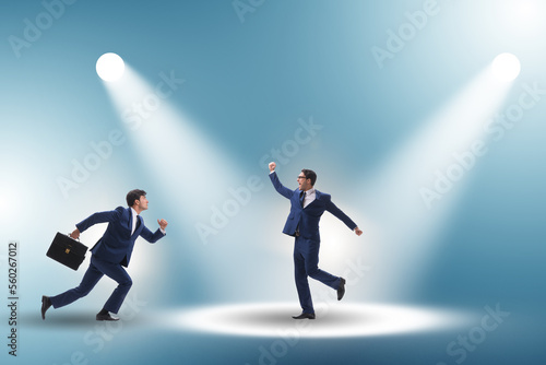 Business people under the spotlight
