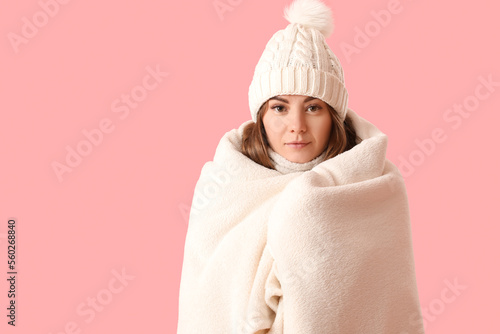 Frozen young woman in warm ...