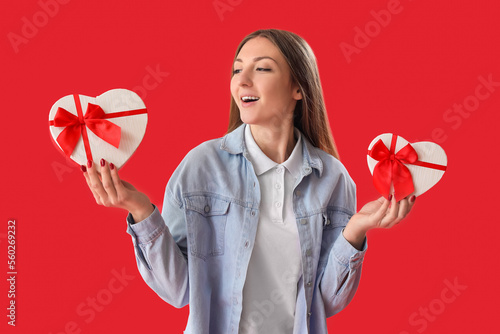 Young woman with gifts on r...