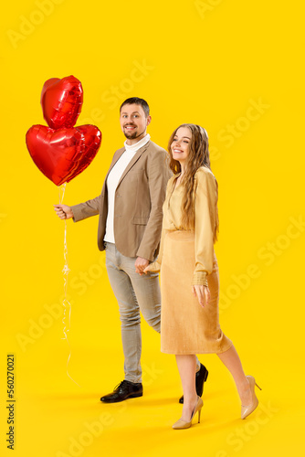 Happy young couple with hea...