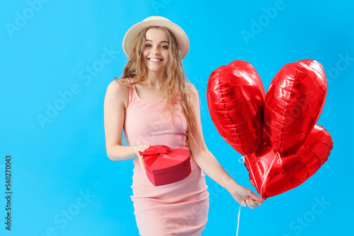 Happy young woman with hear...