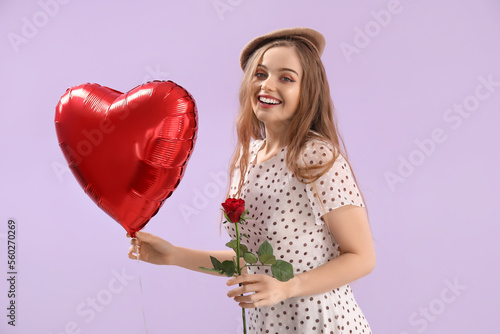 Happy young woman with hear...