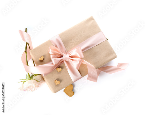 Gift box with hearts and roses for Valentine's Day on white background