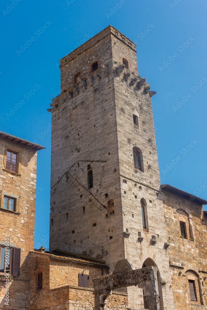 Ancient medieval tower in the town center of San Gimignano, Tuscany,  Italy